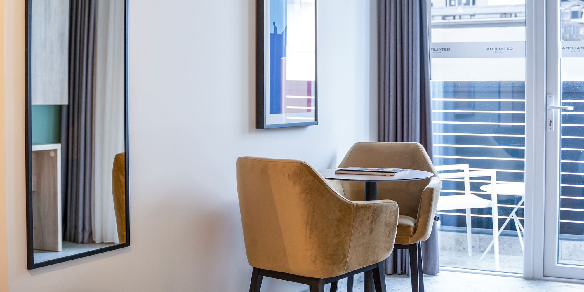 a room with a table and chairs