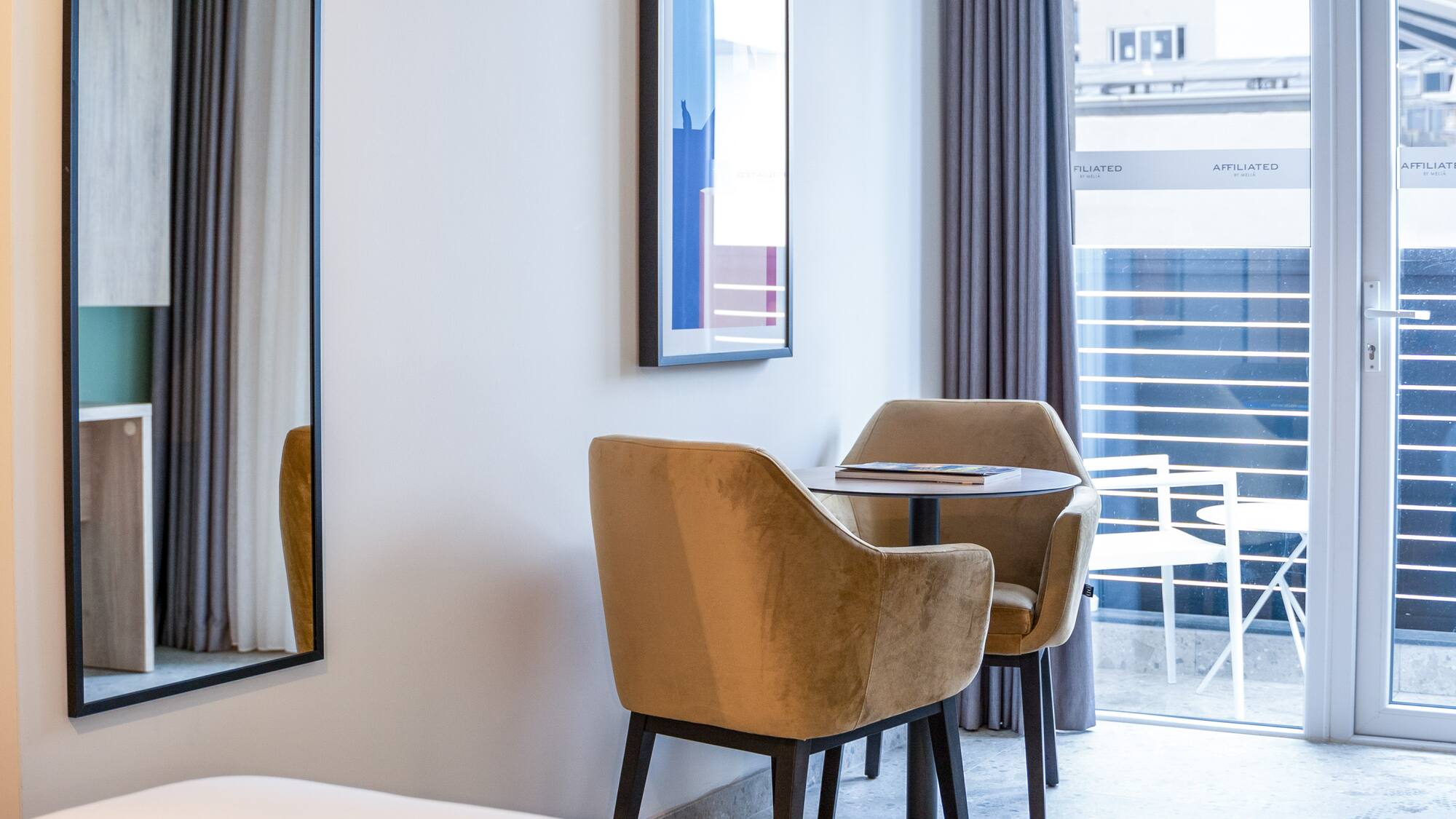a room with a table and chairs