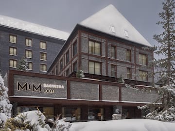 a building with snow on the ground