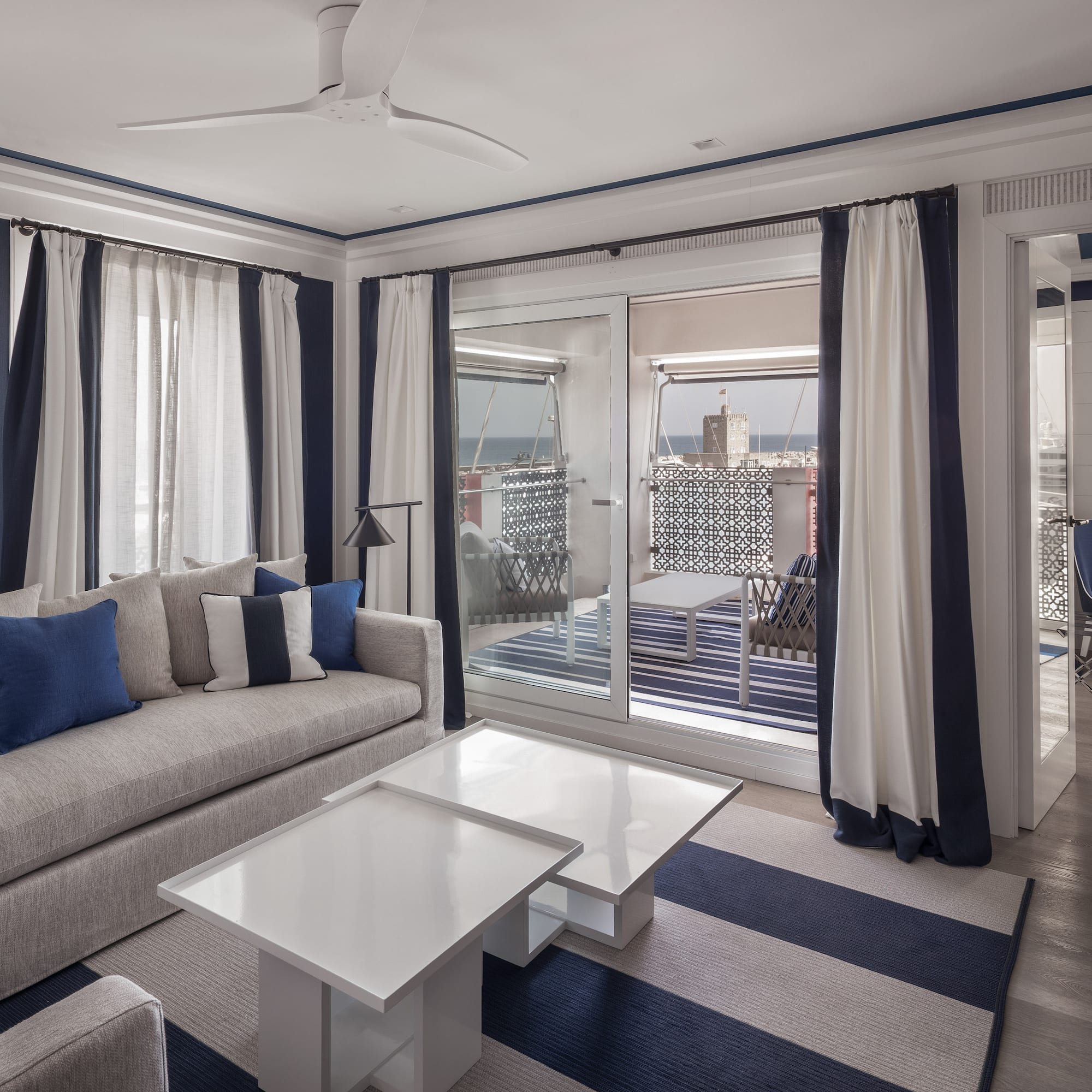 a living room with a couch and a table