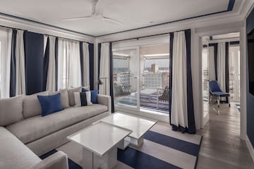 a living room with a couch and a table