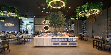 a restaurant with tables and chairs