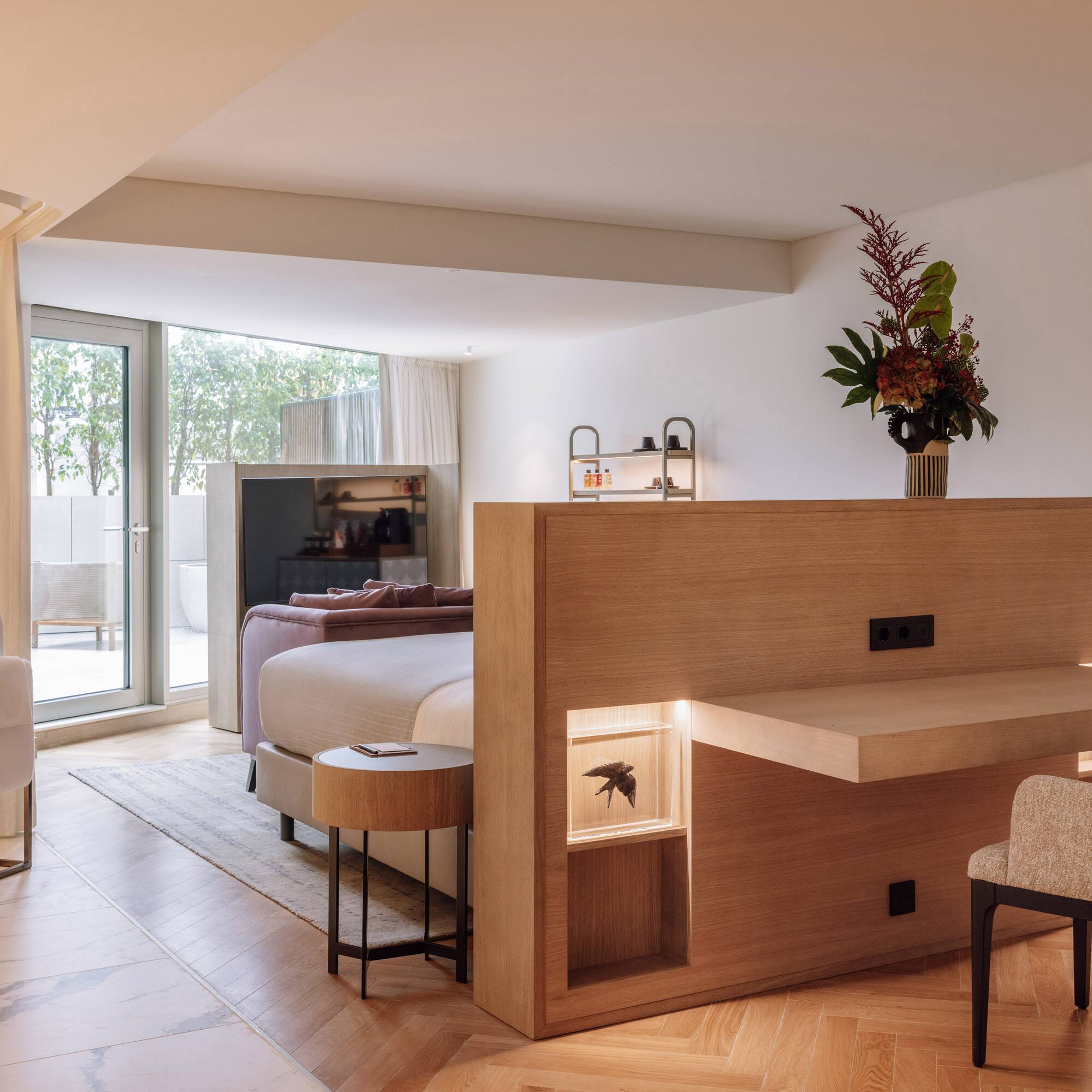 a room with a bed and a desk