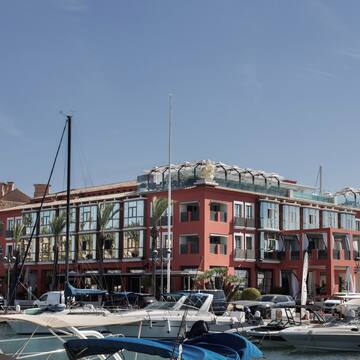 a building with many boats in the water