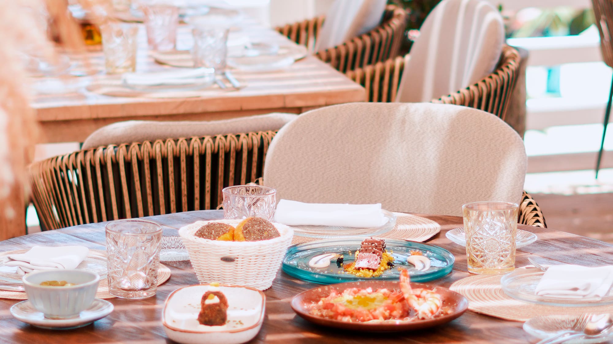 a table with plates and glasses on it