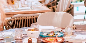 a table with plates and glasses on it