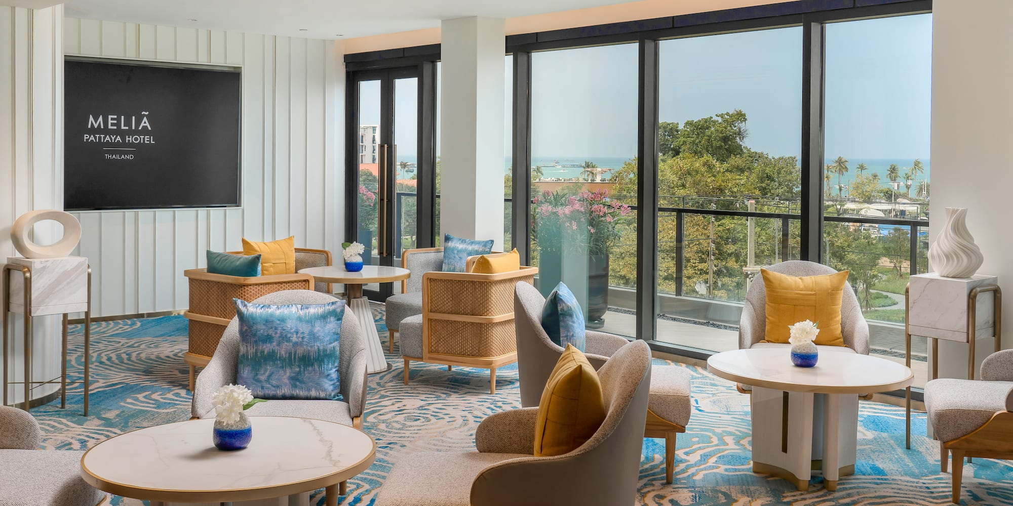 a room with chairs and tables