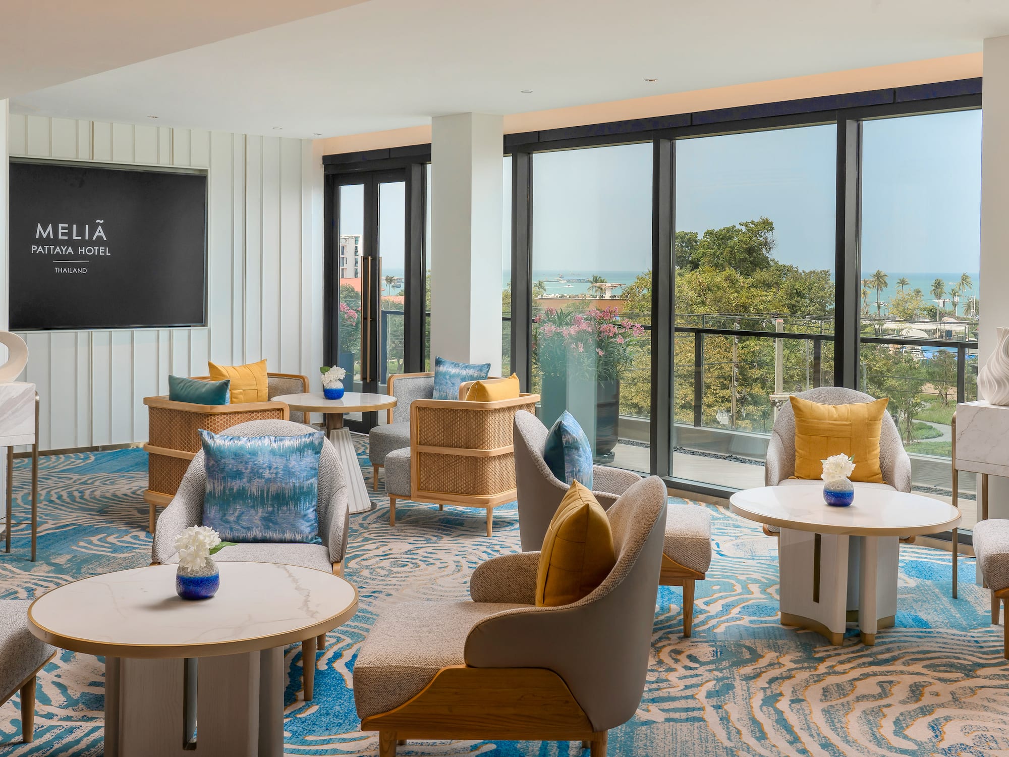 a room with chairs and tables