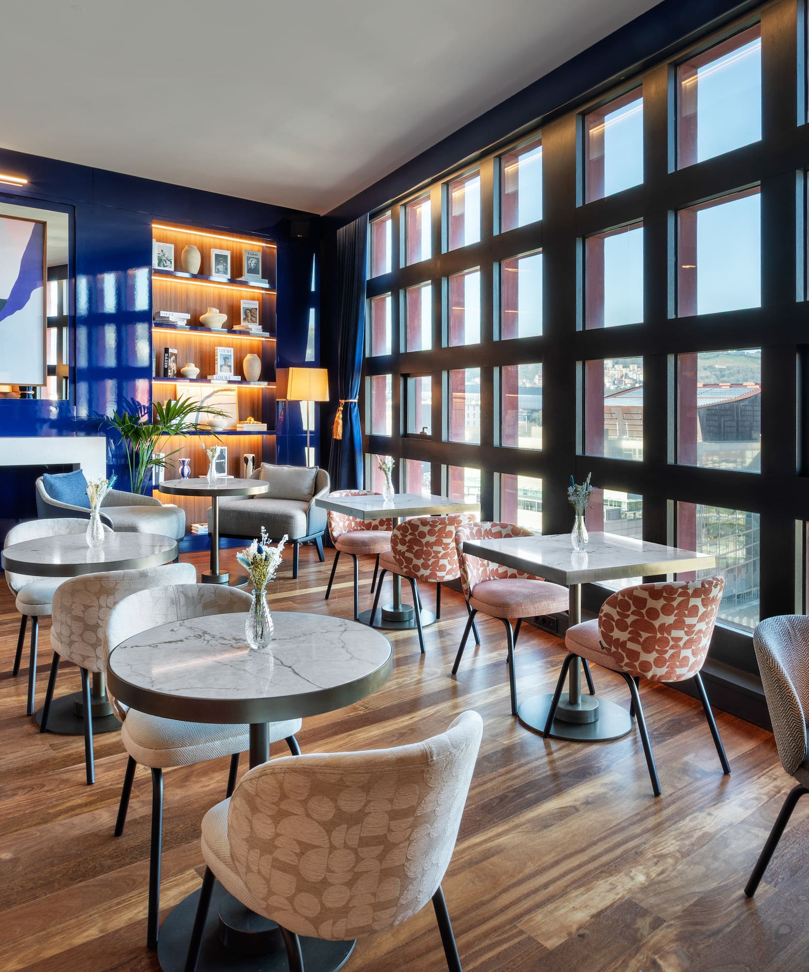 a room with tables and chairs