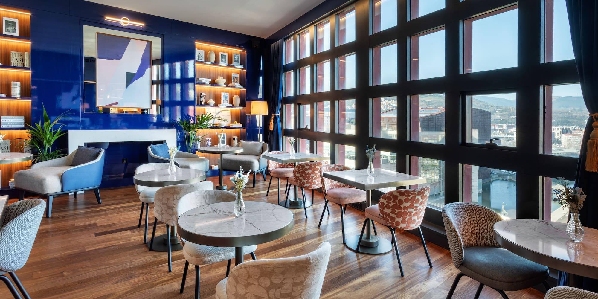 a room with tables and chairs