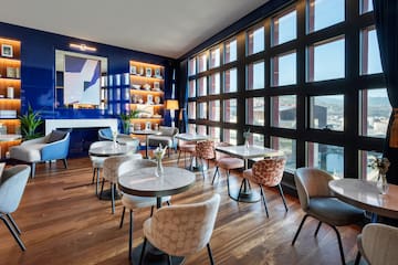 a room with tables and chairs