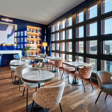 a room with tables and chairs