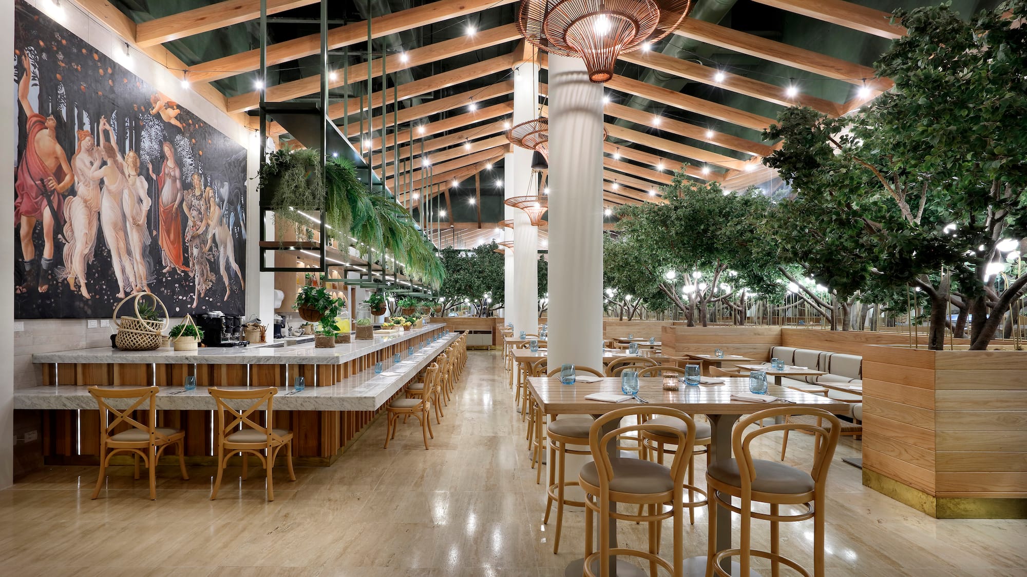 a restaurant with tables and chairs