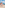 Family of four walking hand-in-hand on a sunny sandy beach vacation.