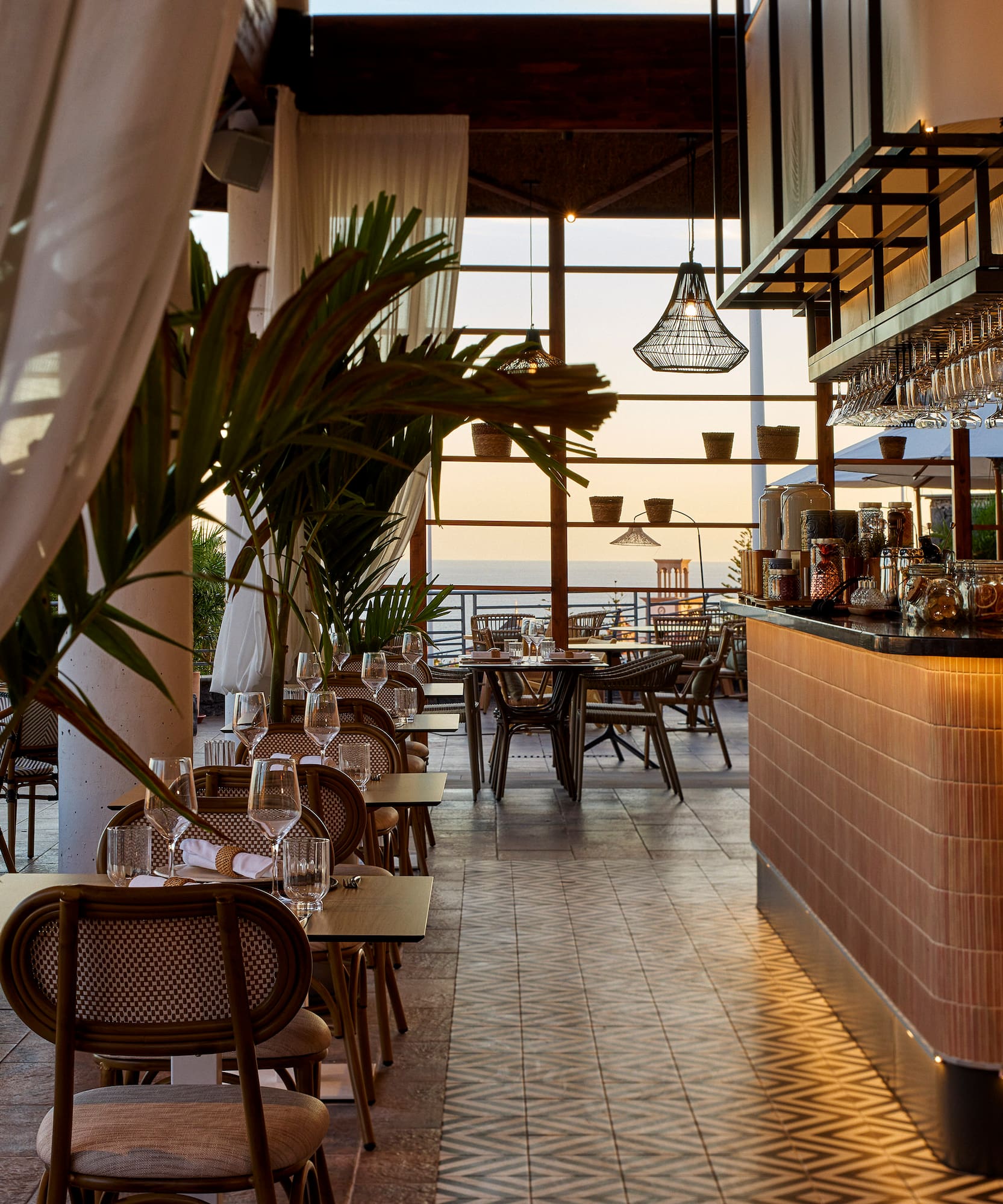 a restaurant with tables and chairs