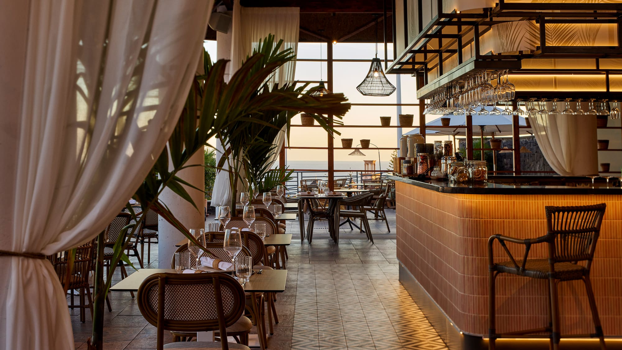 a restaurant with tables and chairs