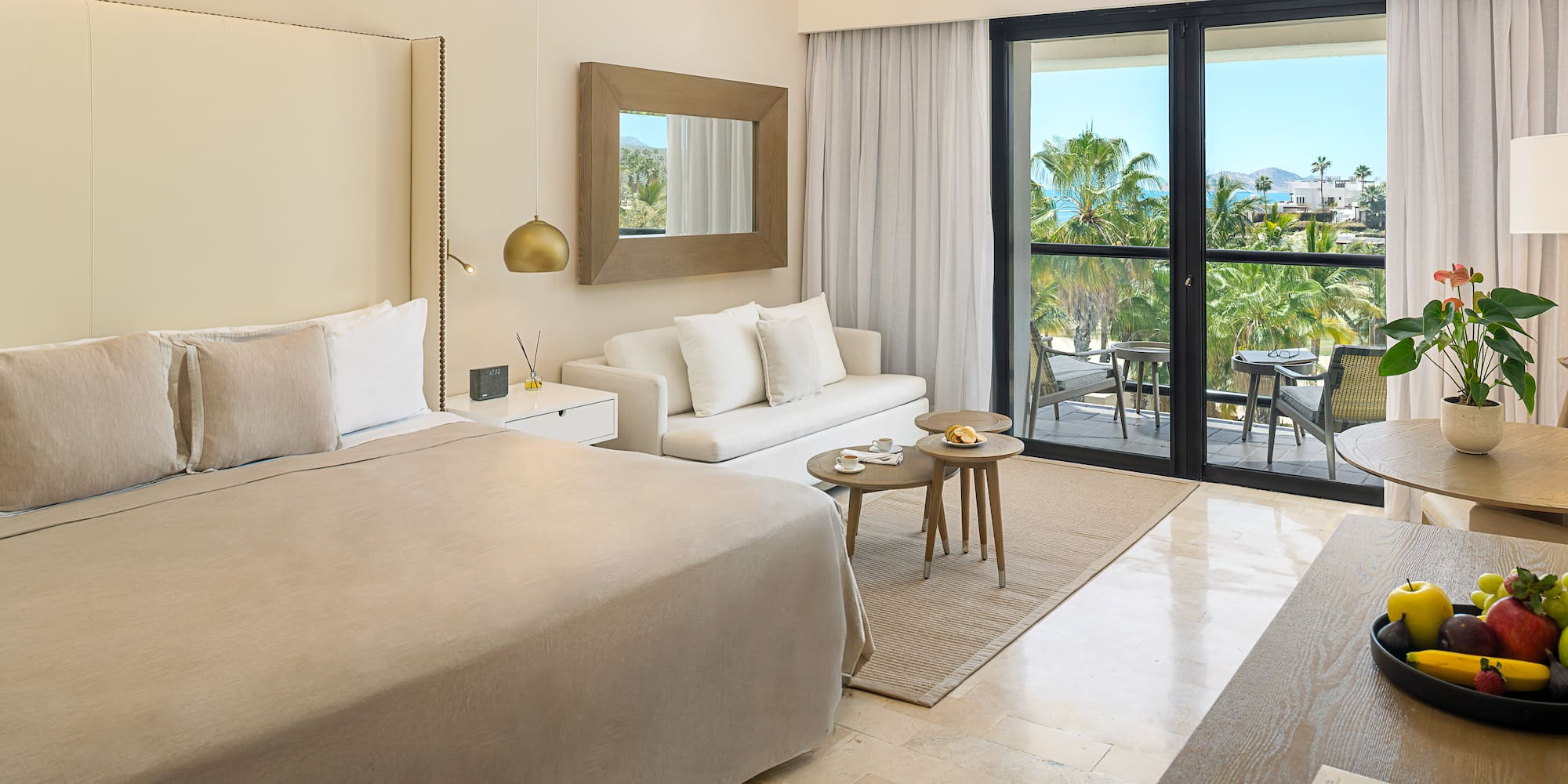 a bedroom with a bed and a couch