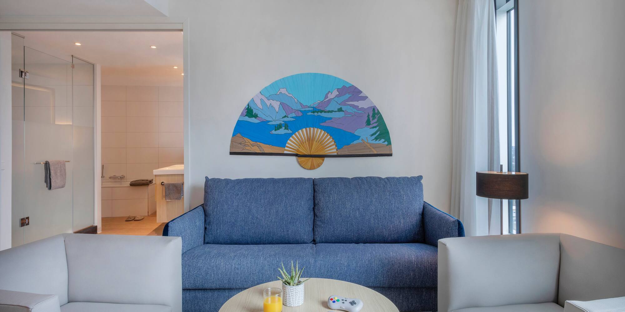 a living room with a couch and a coffee table