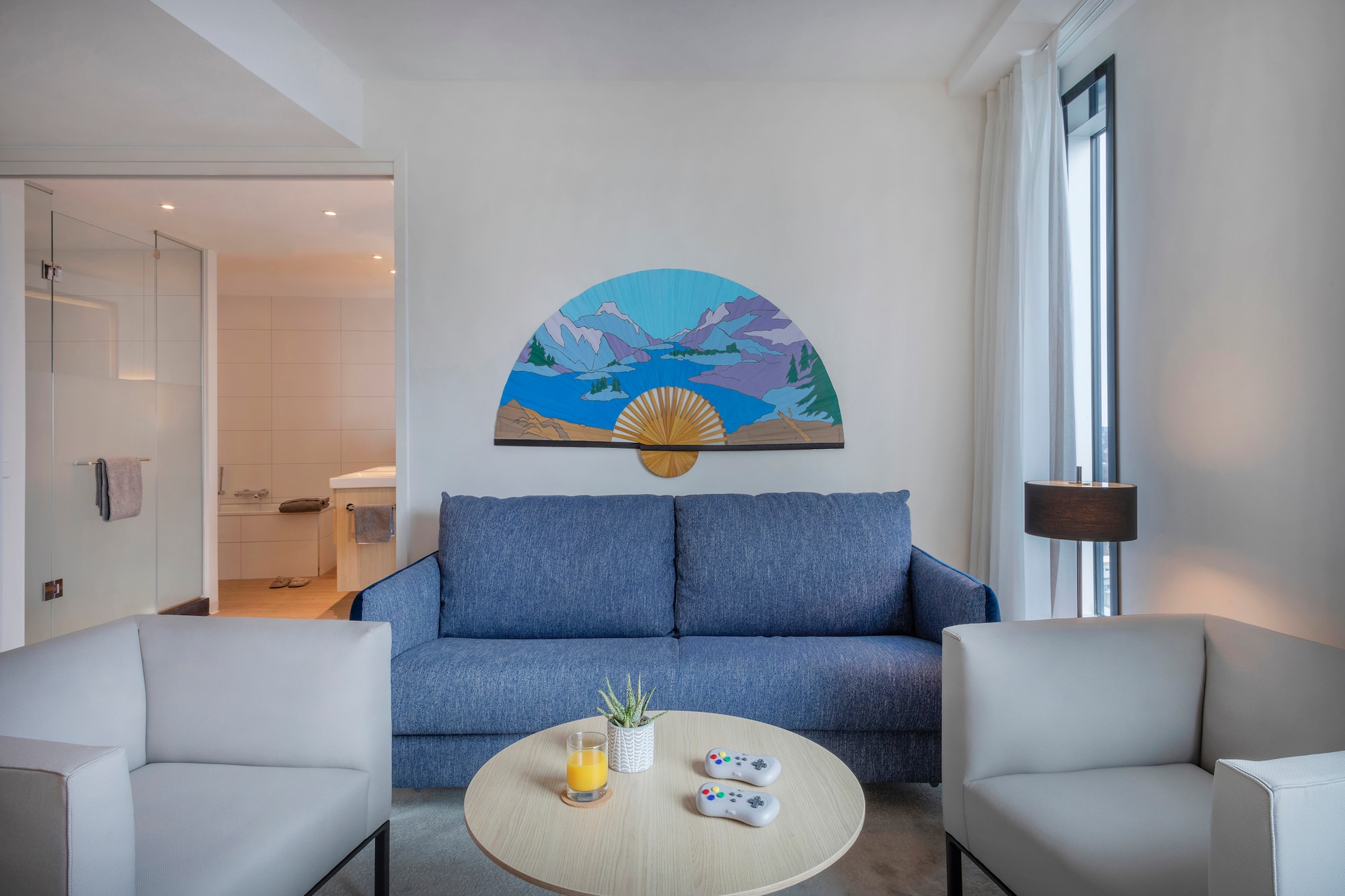 a living room with a couch and a coffee table