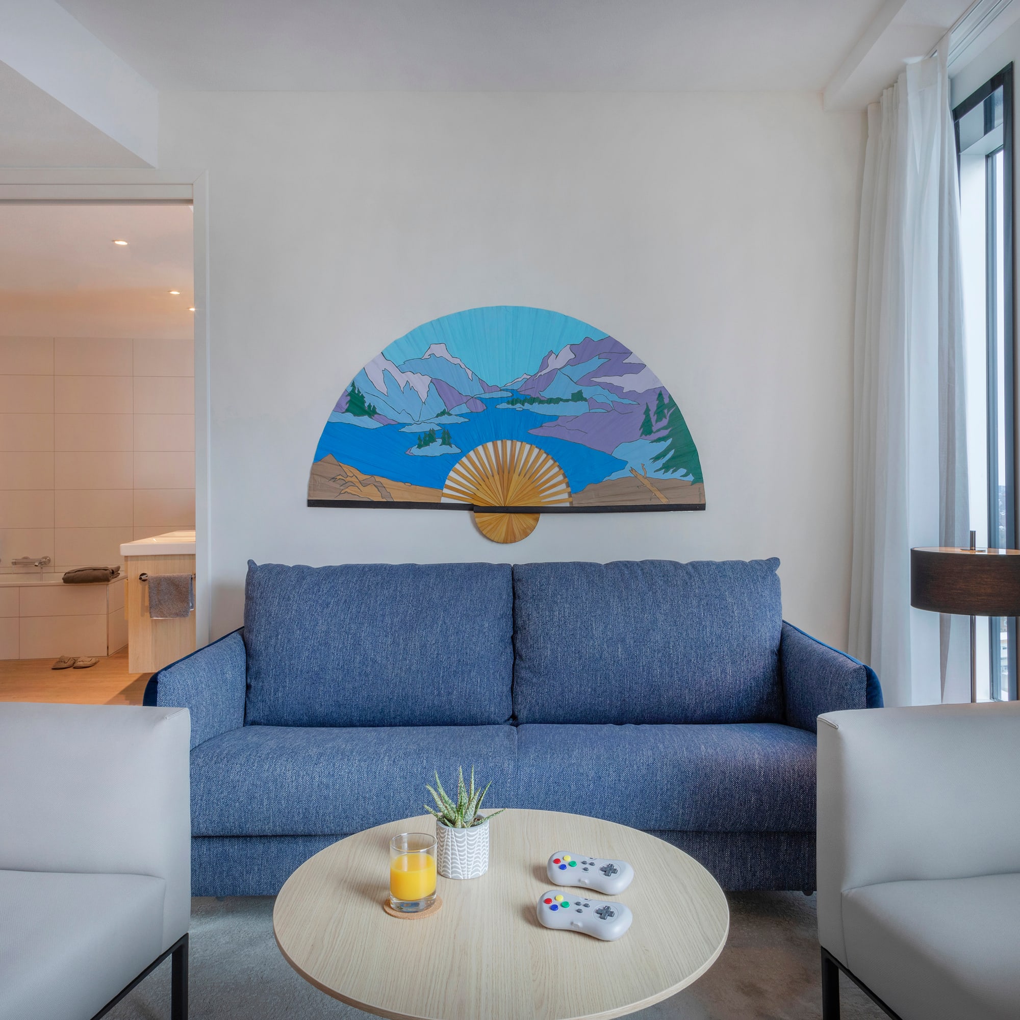 a living room with a couch and a coffee table