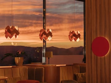 a room with a view of the sunset