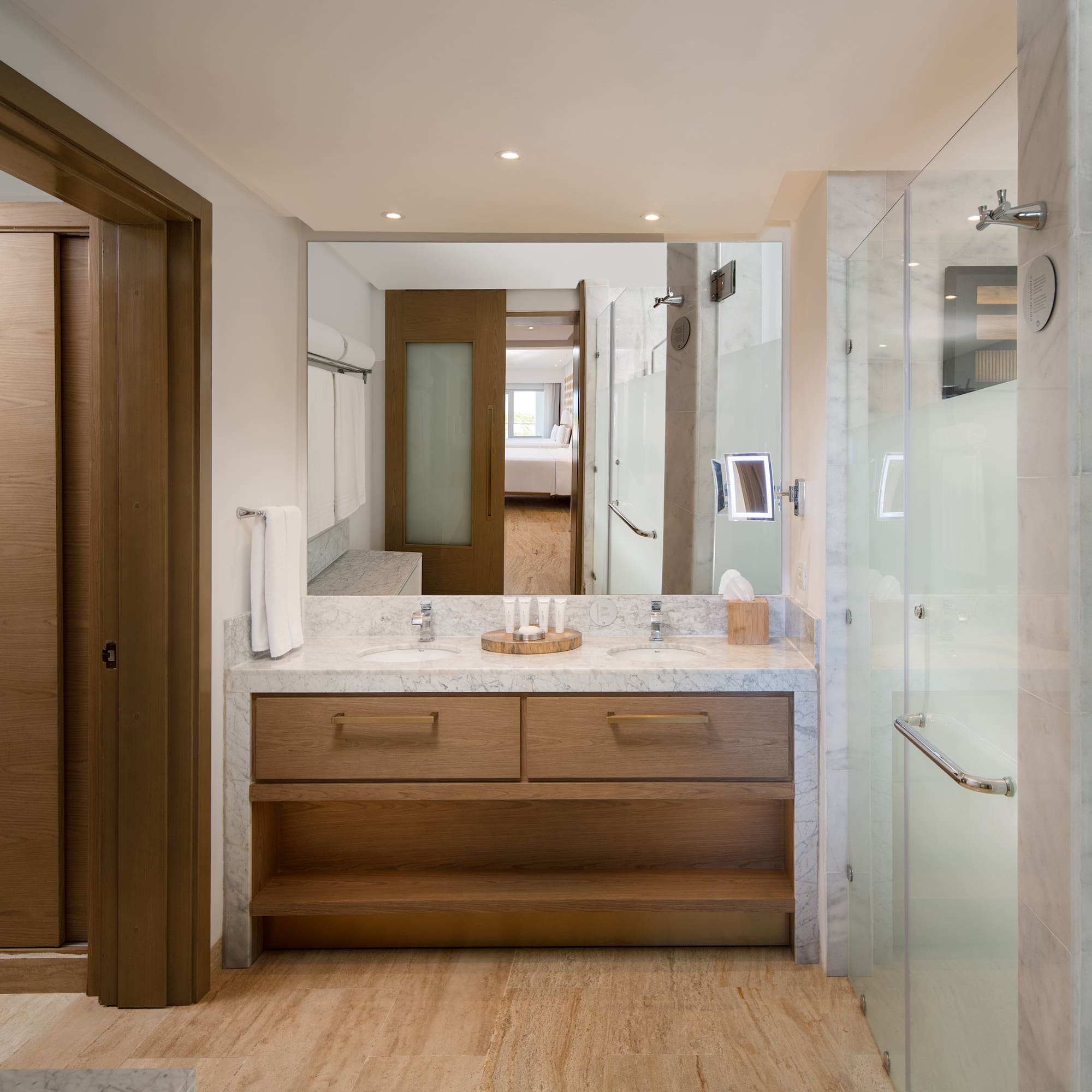 a bathroom with a marble countertop and a shower