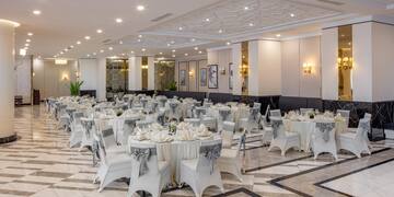 a room with tables and chairs