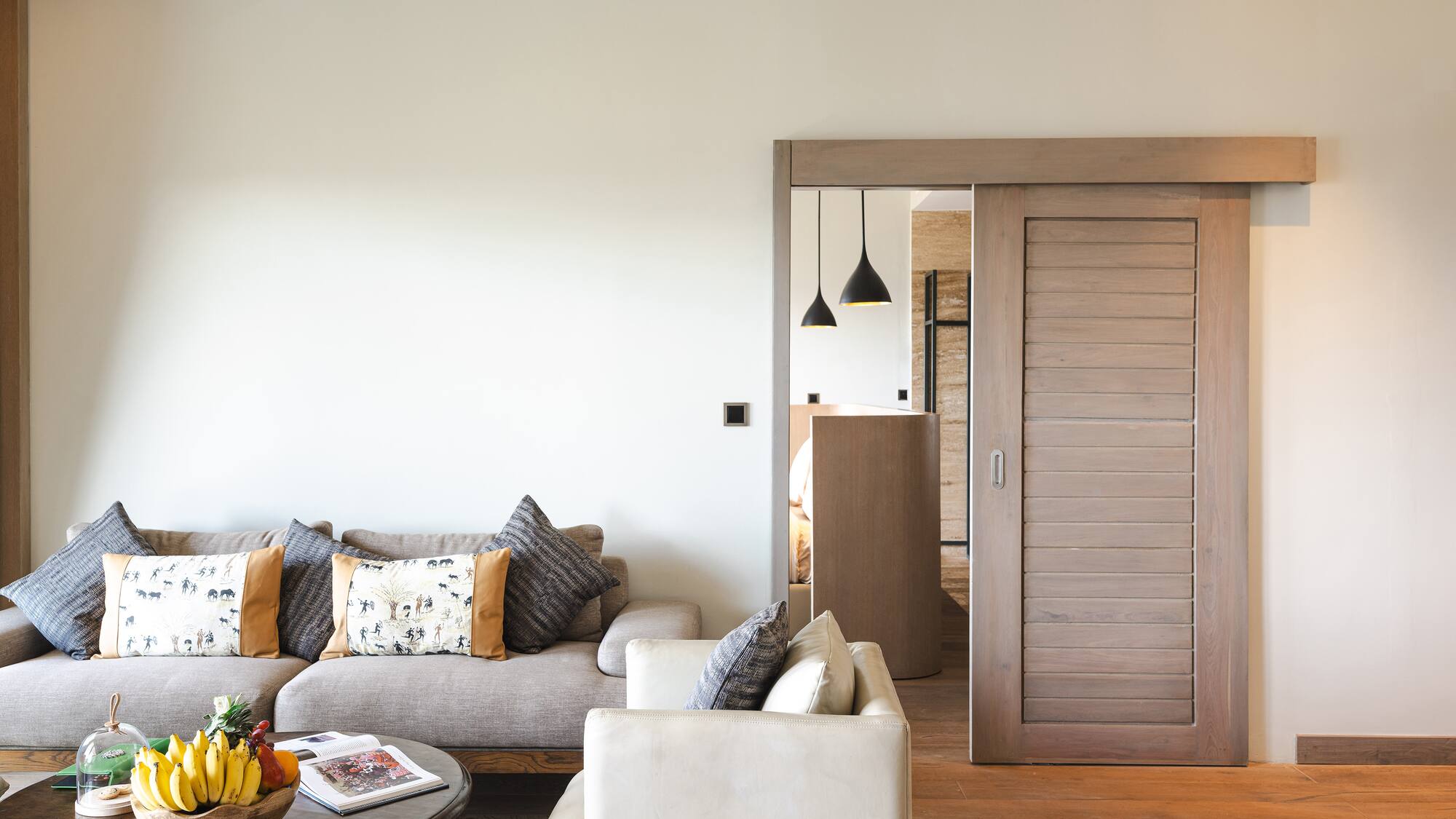 a living room with a couch and a coffee table