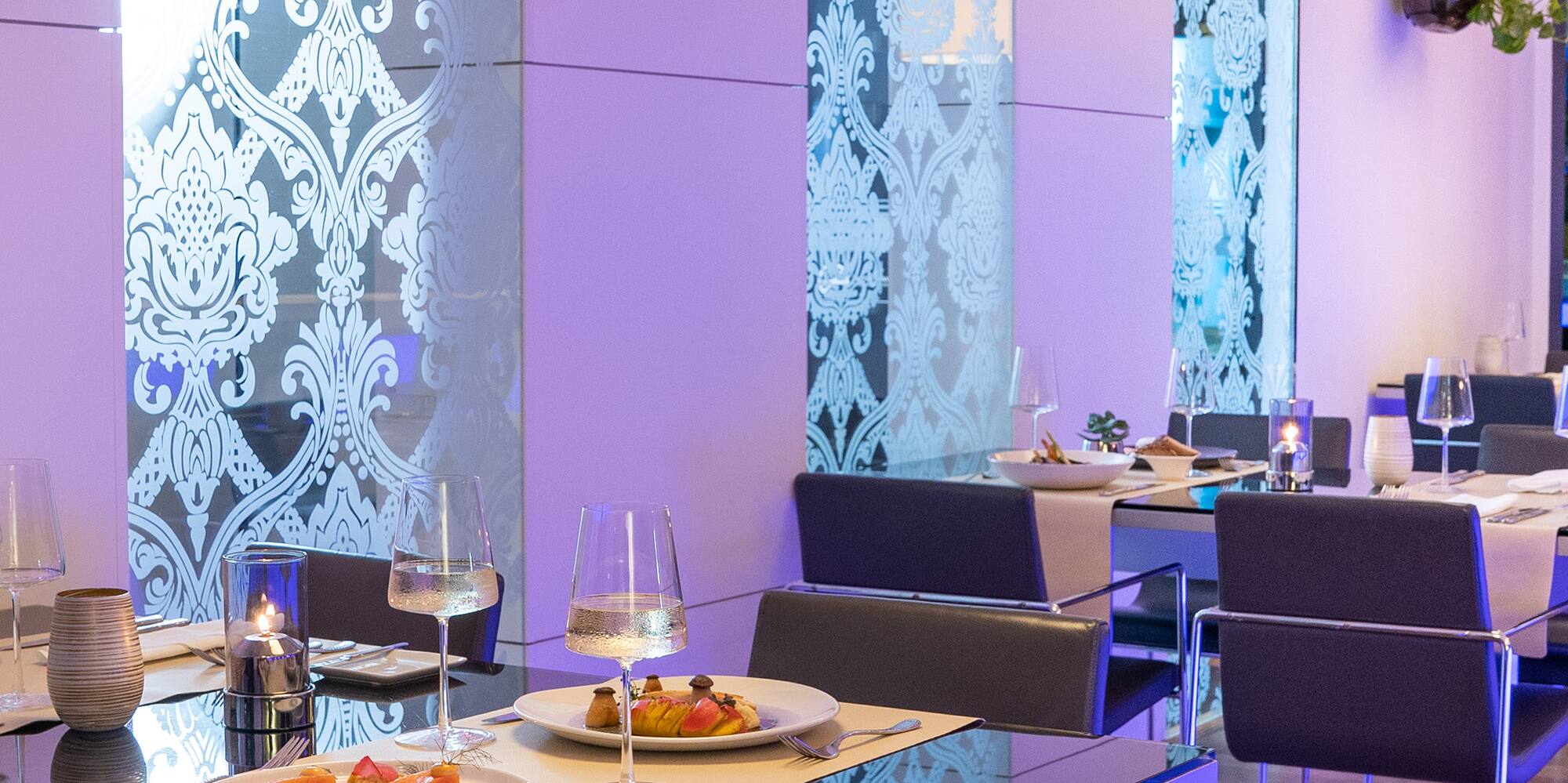 a restaurant with tables and chairs