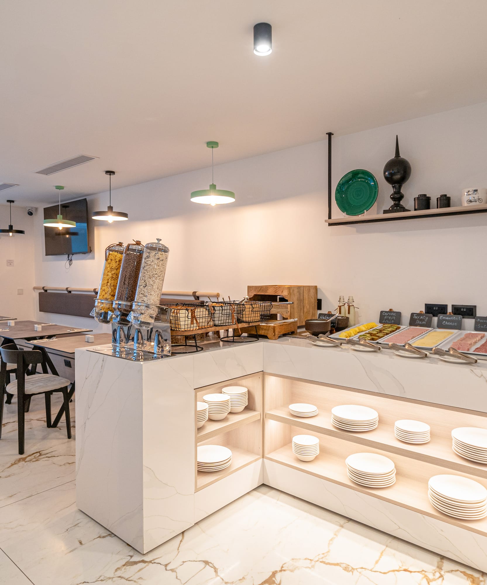 a counter with plates and bowls on it
