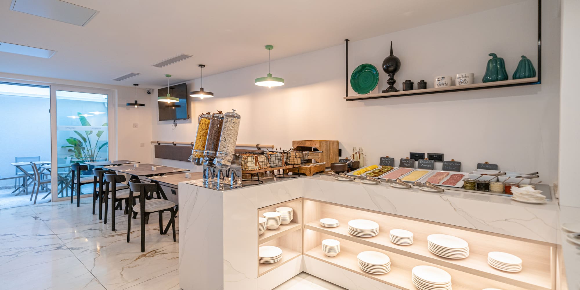 a counter with plates and bowls on it