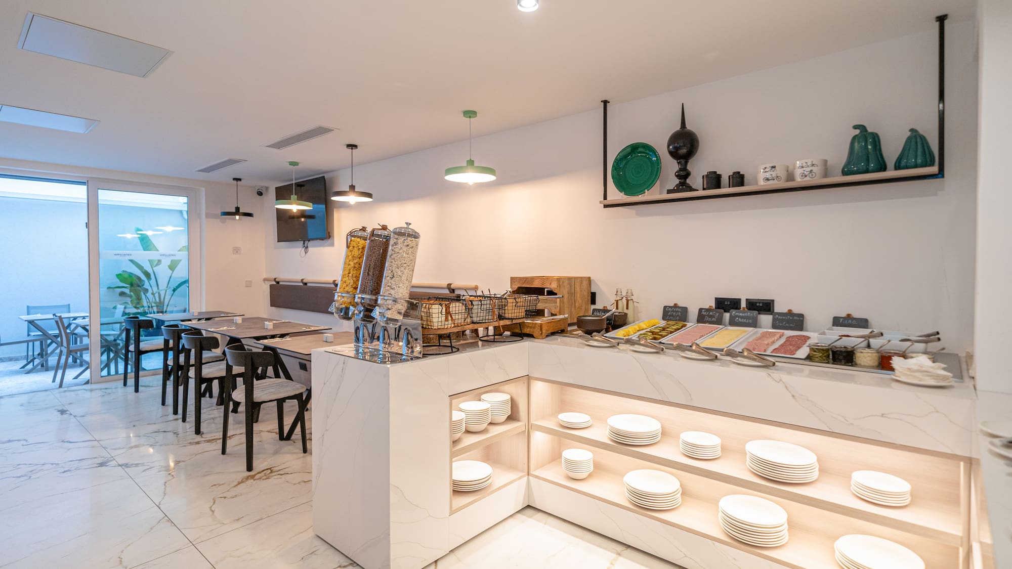 a counter with plates and bowls on it