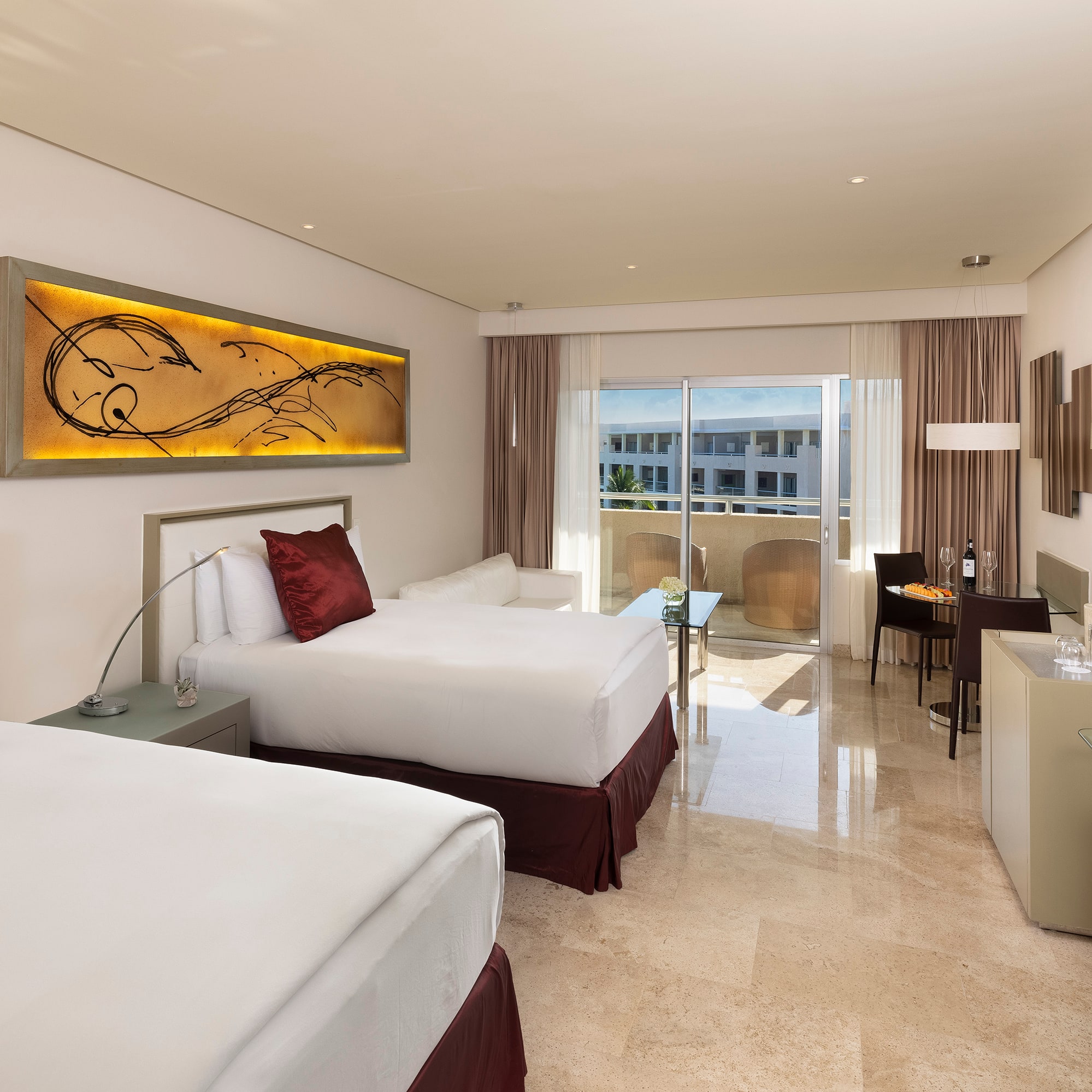 a hotel room with two beds