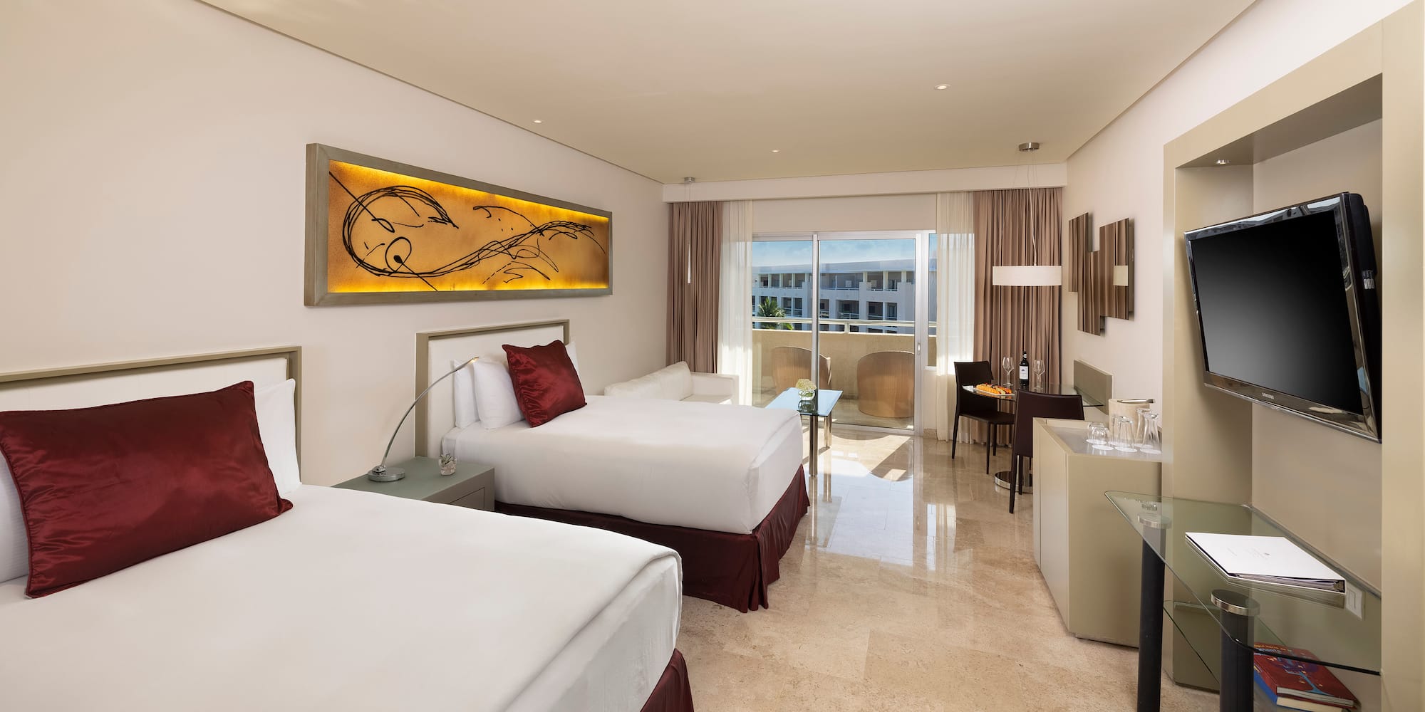 a hotel room with two beds