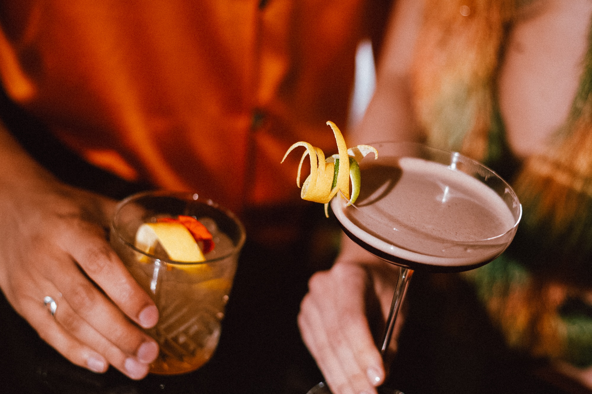 a person holding a drink