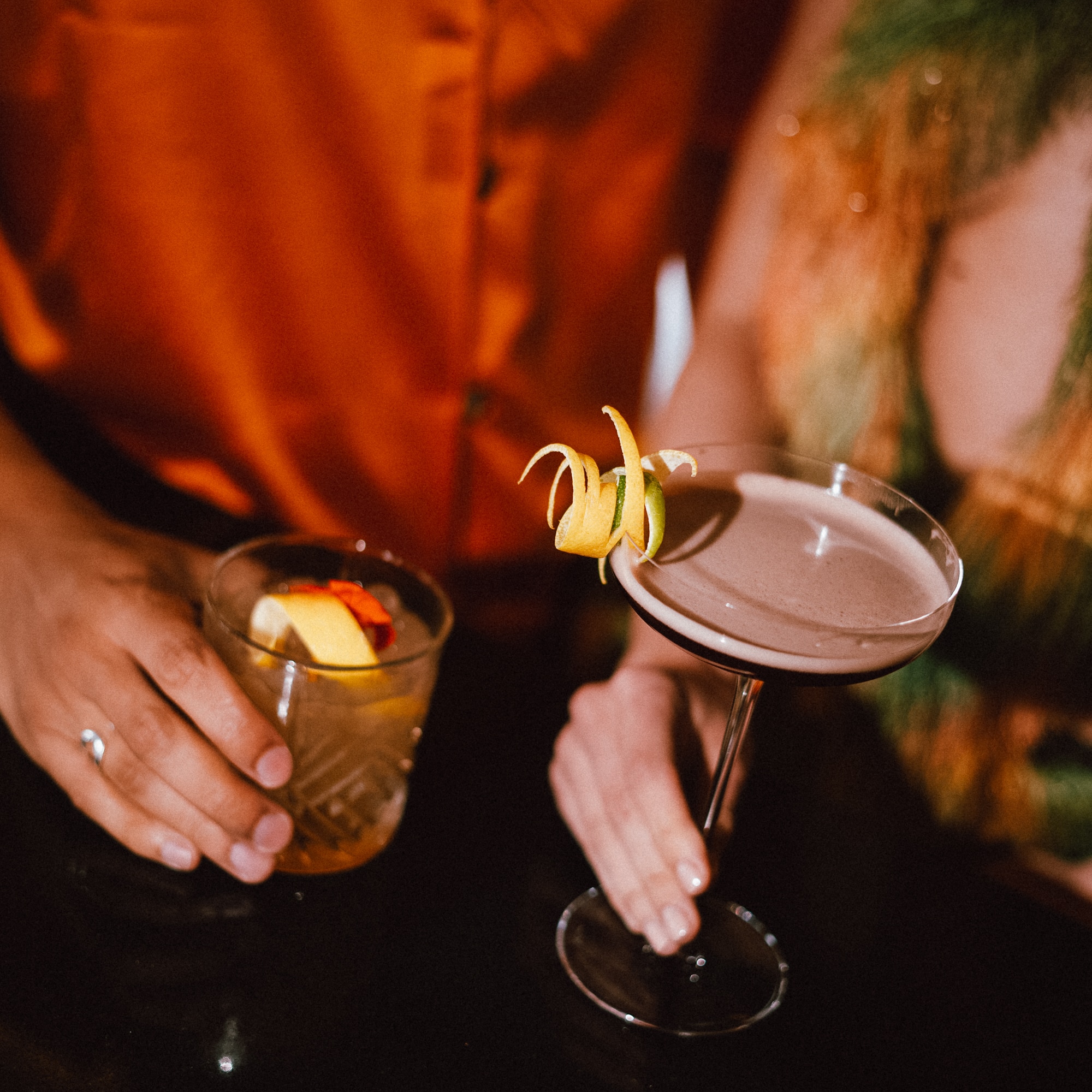 a person holding a drink