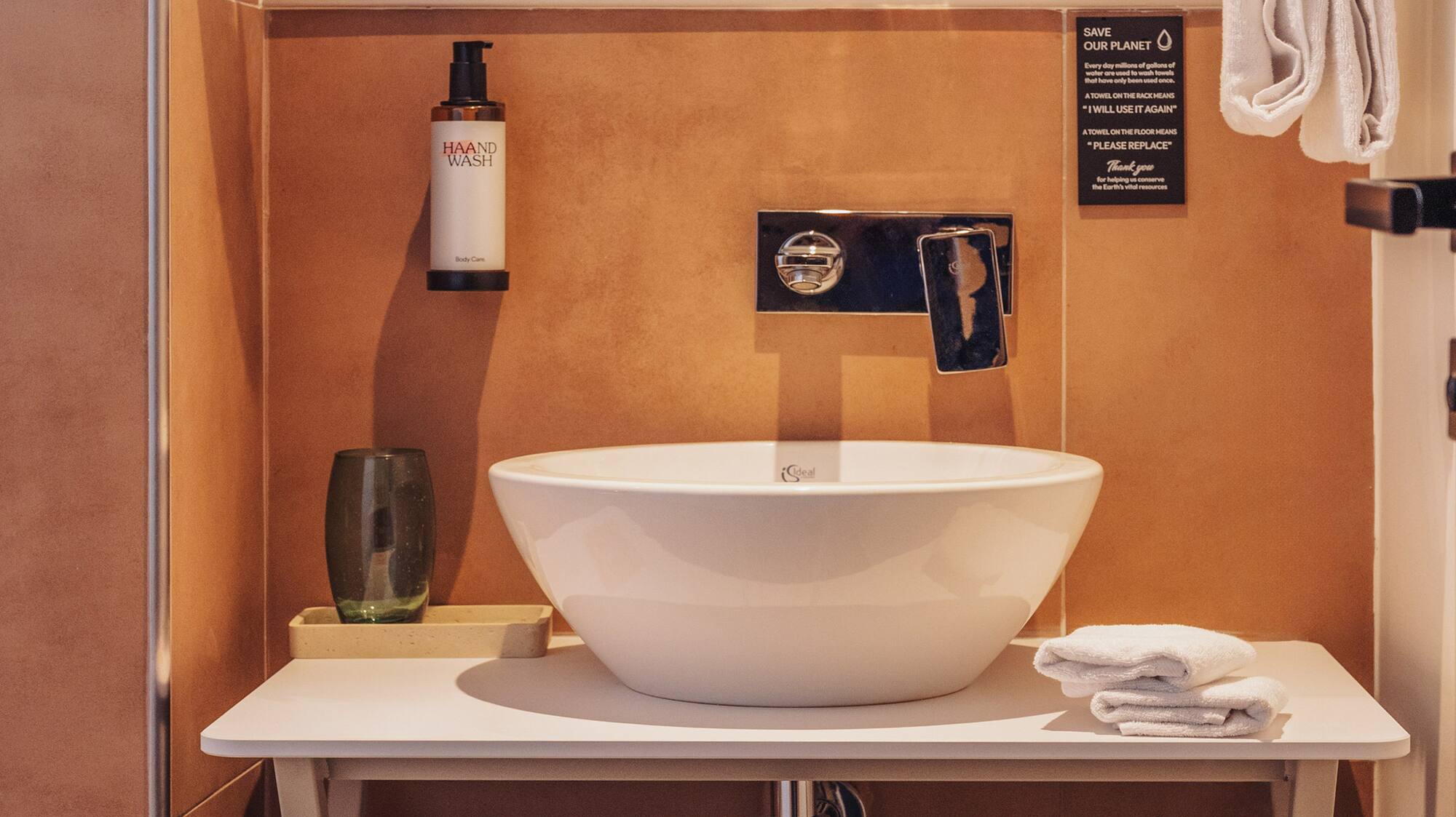 a sink and mirror in a bathroom