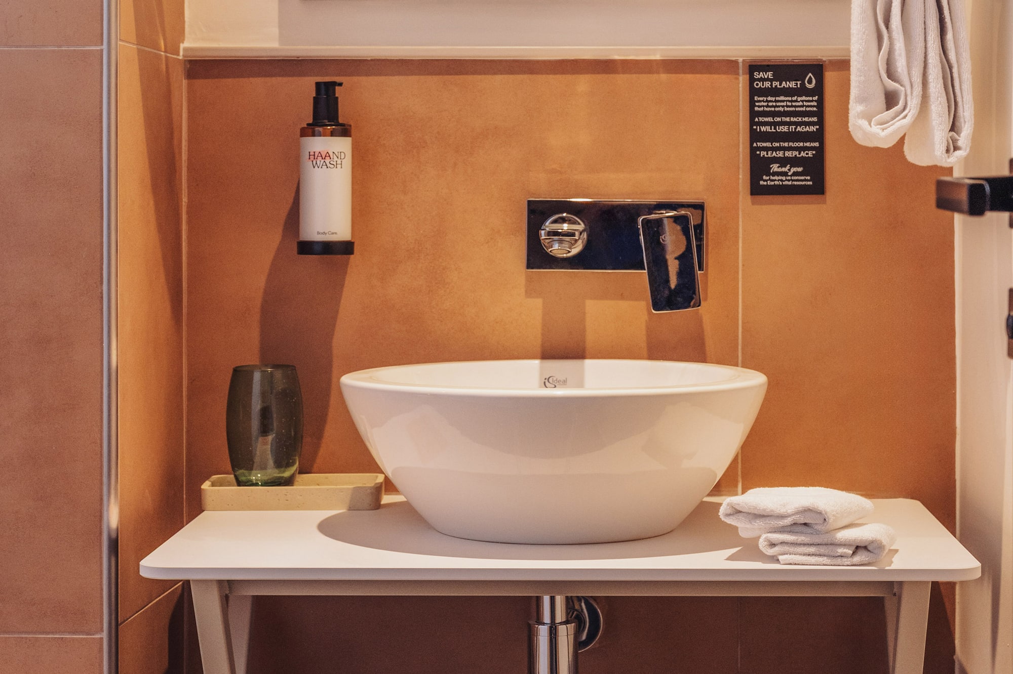 a sink and mirror in a bathroom