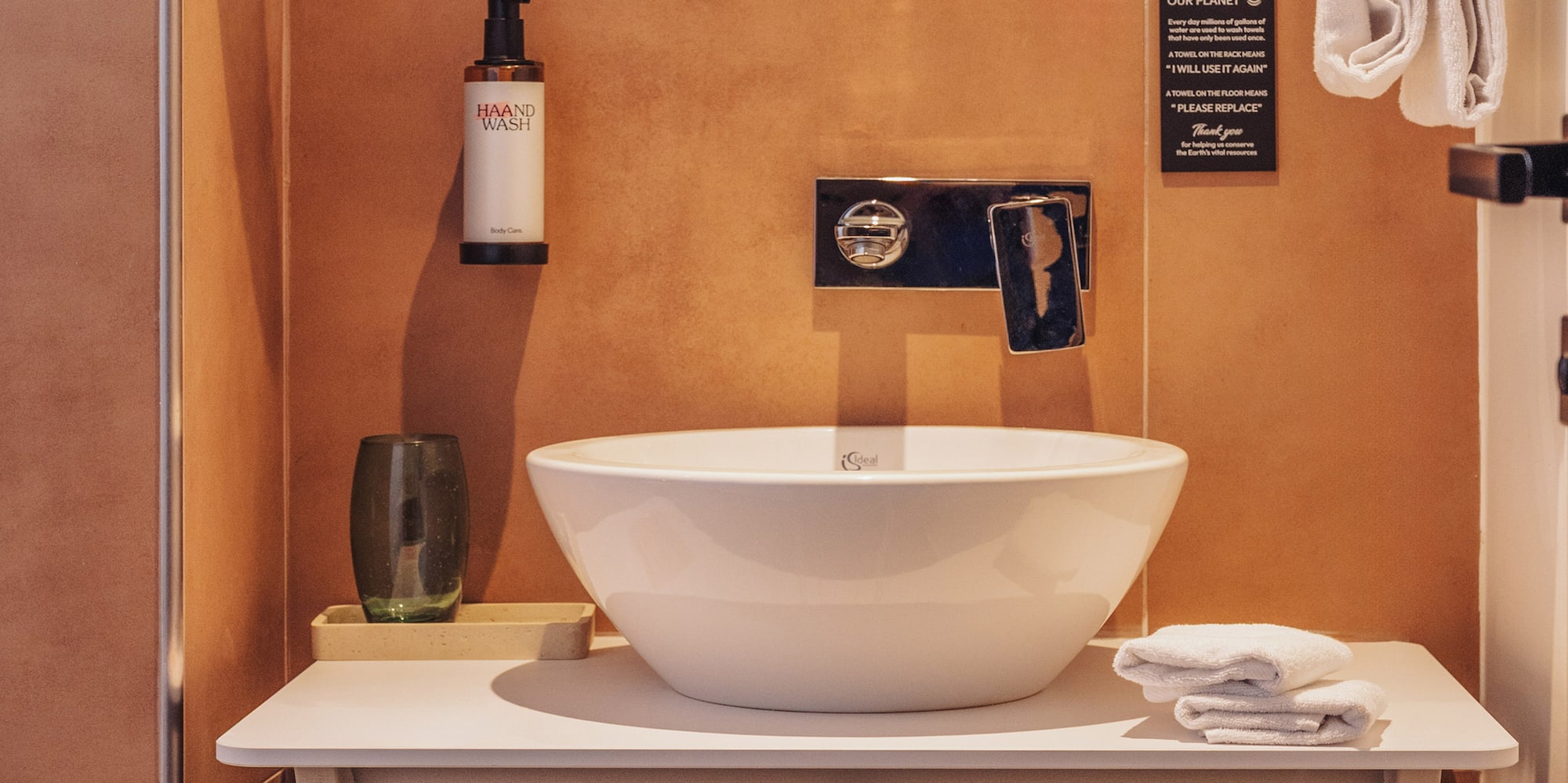 a sink and mirror in a bathroom