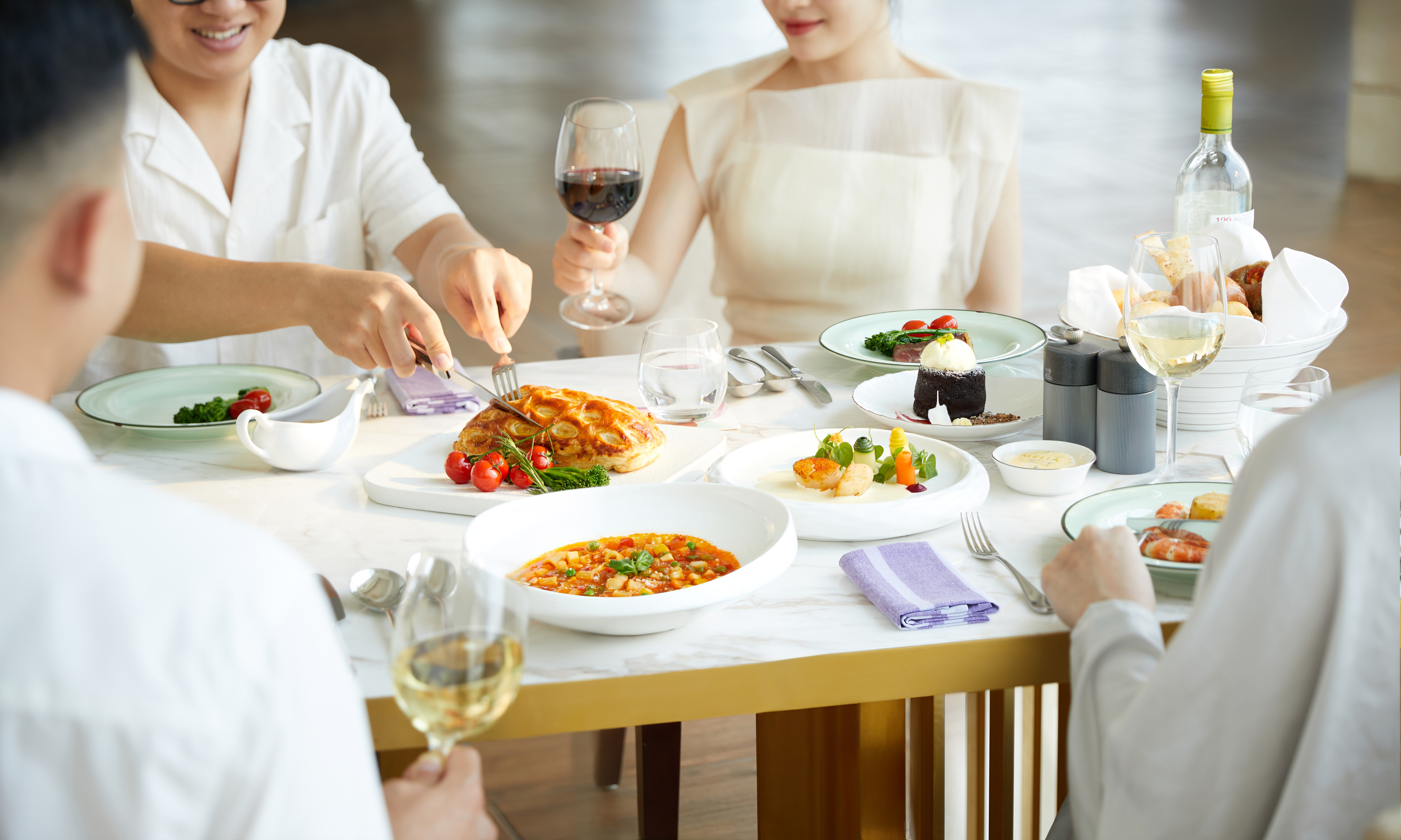 a group of people eating at a table