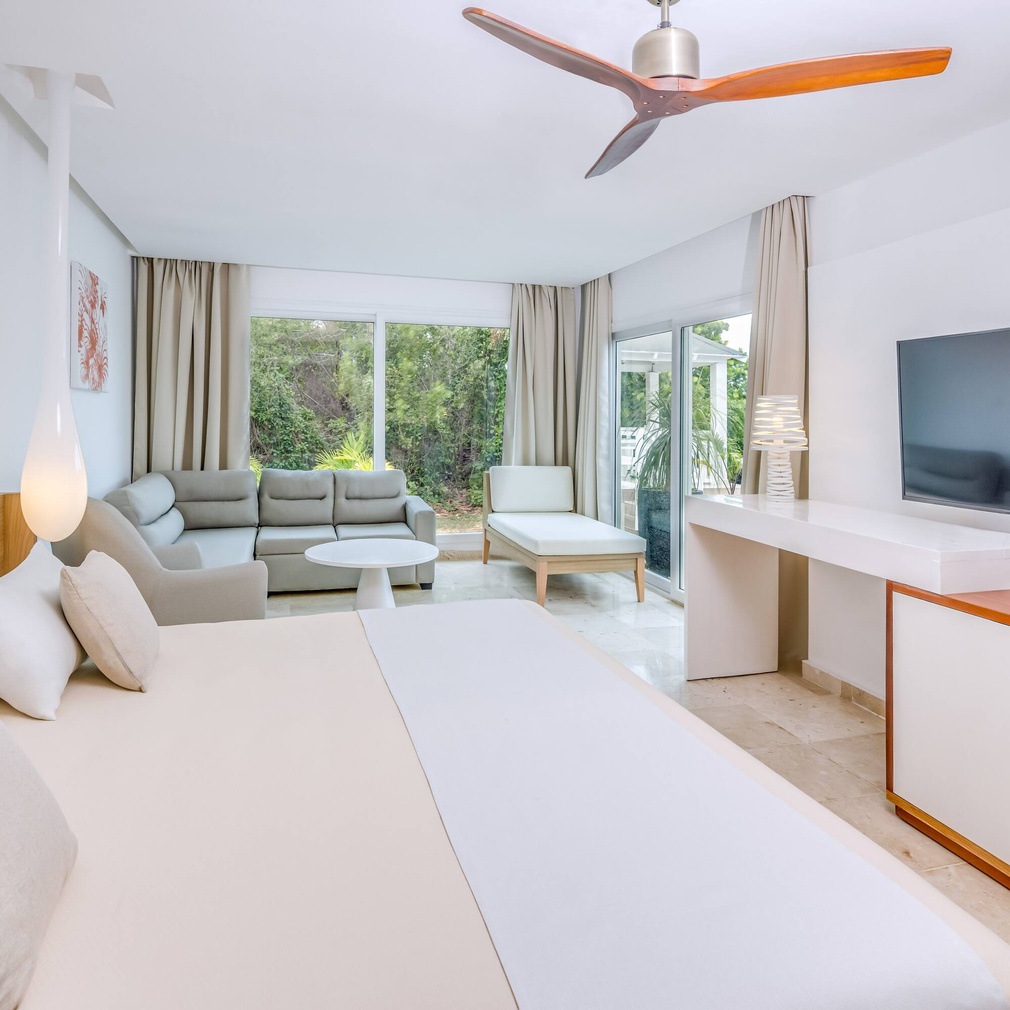 a room with a television and a bed