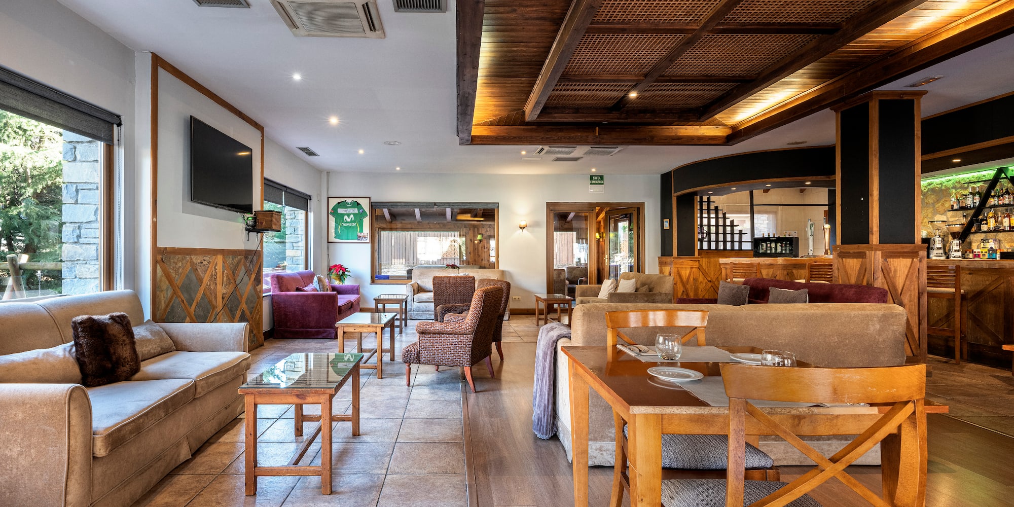 a room with furniture and a tv