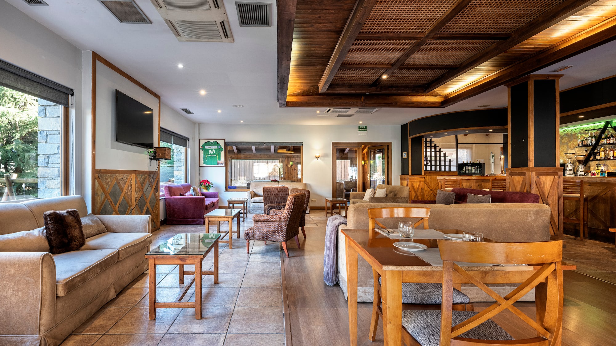 a room with furniture and a tv