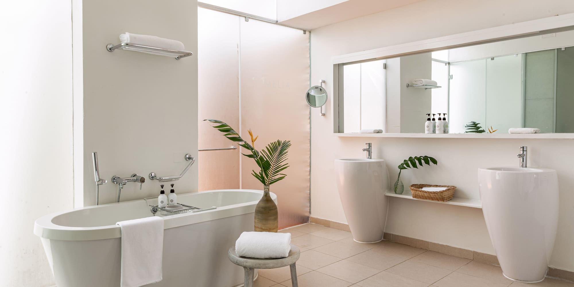 a bathroom with a tub and sink