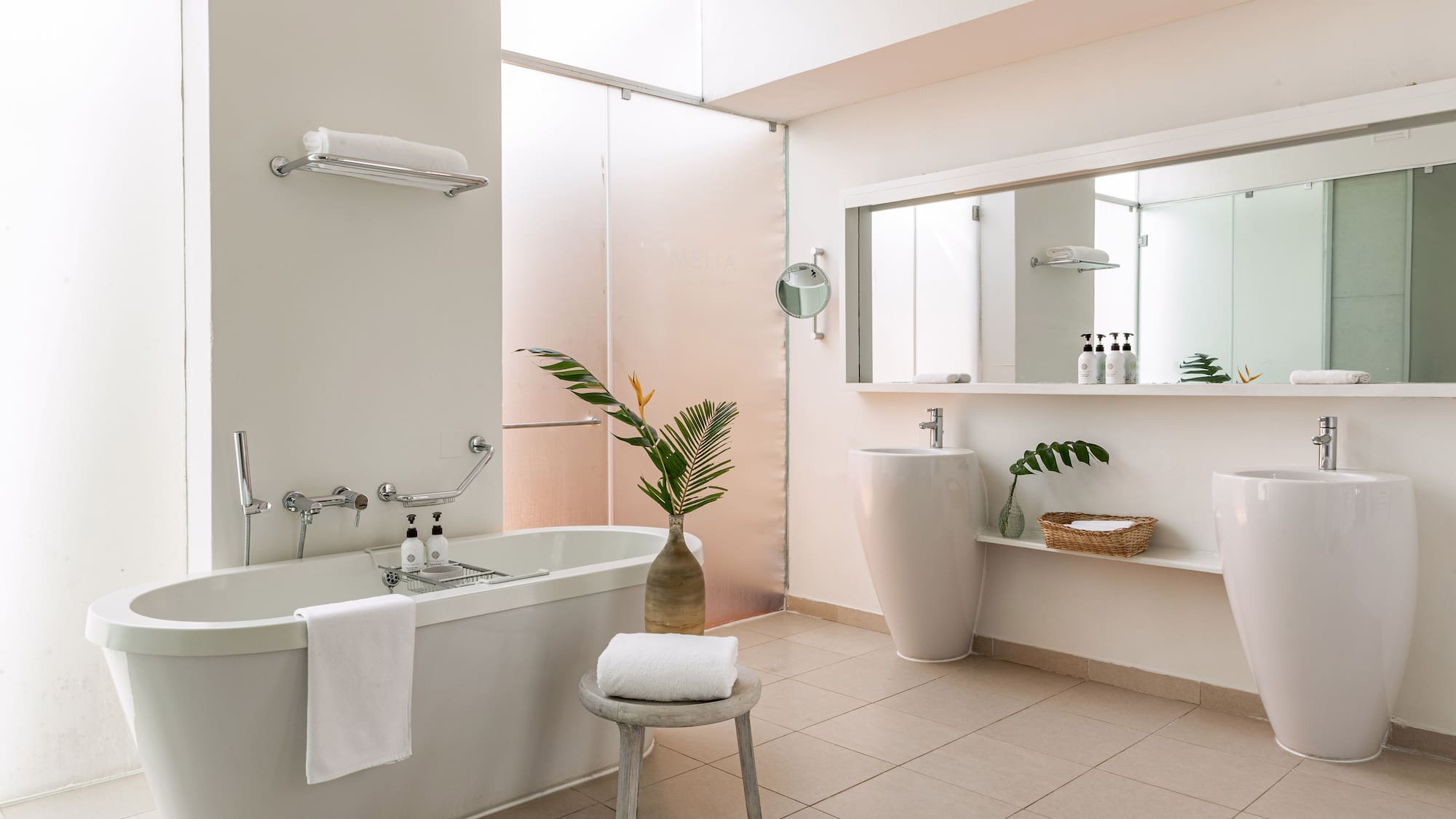 a bathroom with a tub and sink