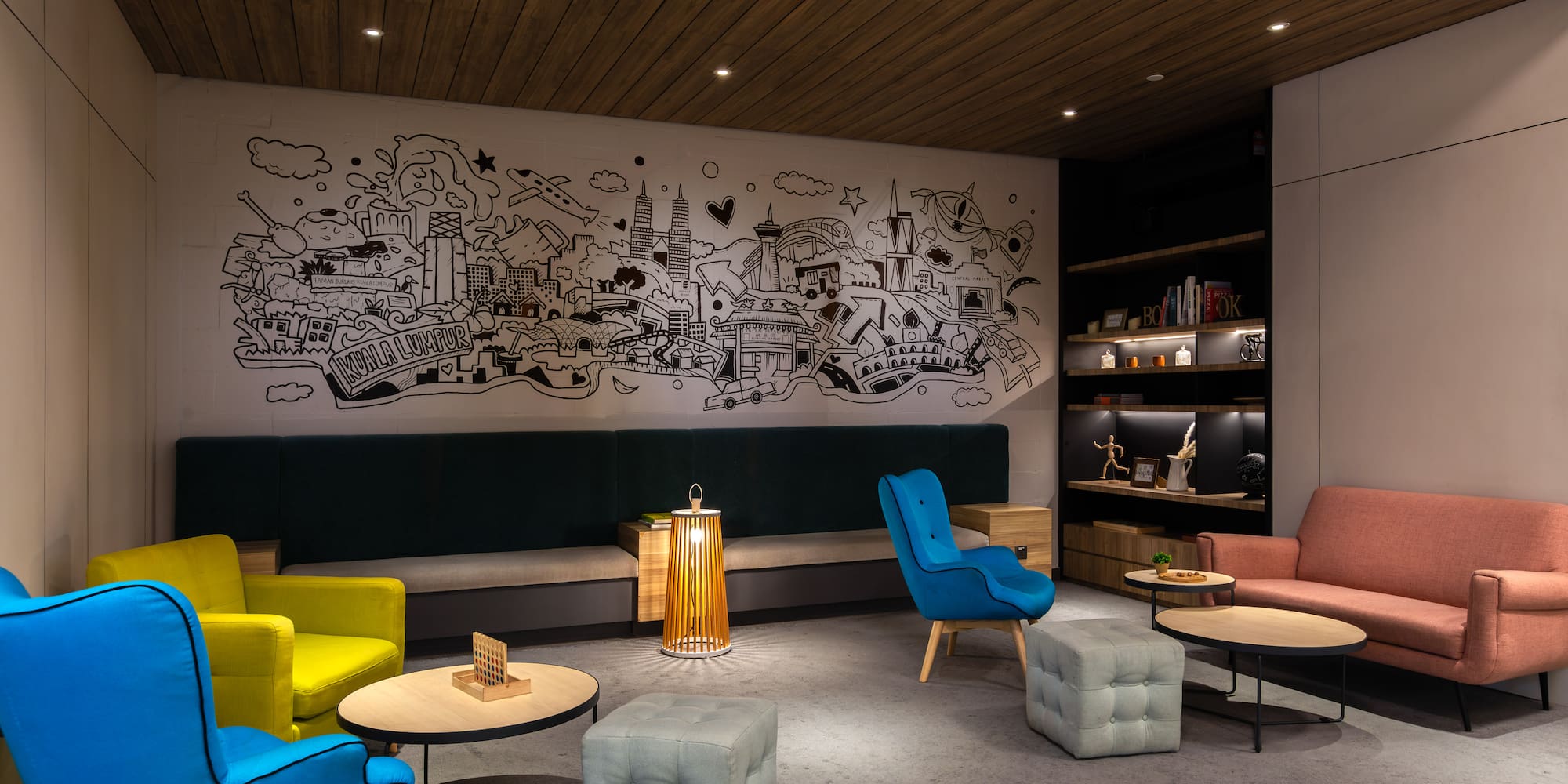 a room with a wall and chairs