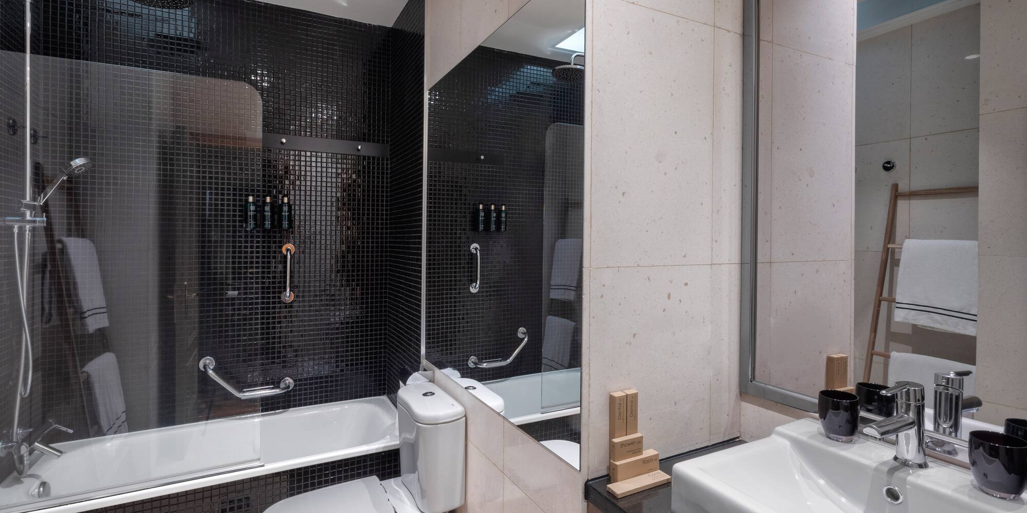 a bathroom with a sink and toilet