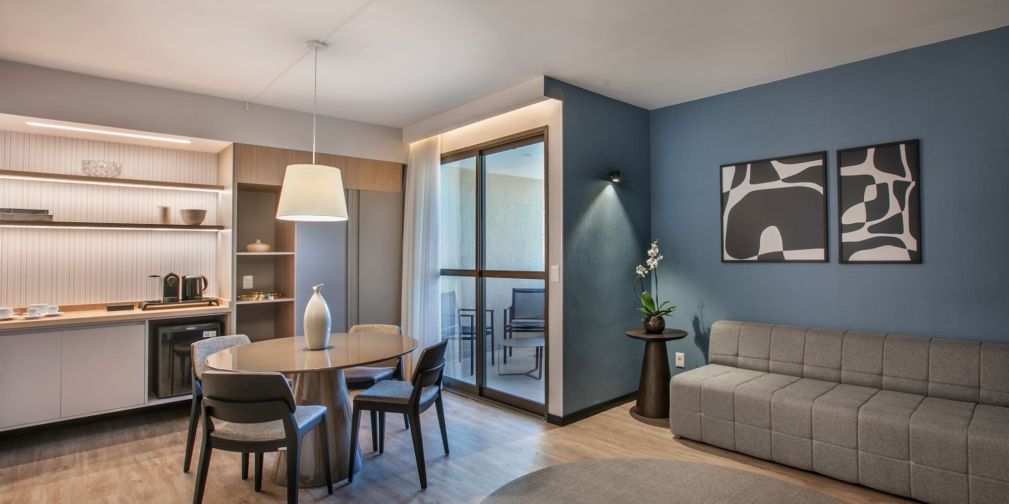 a room with a table and chairs