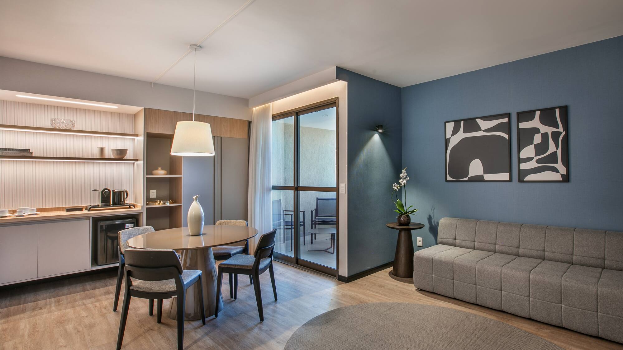 a room with a table and chairs