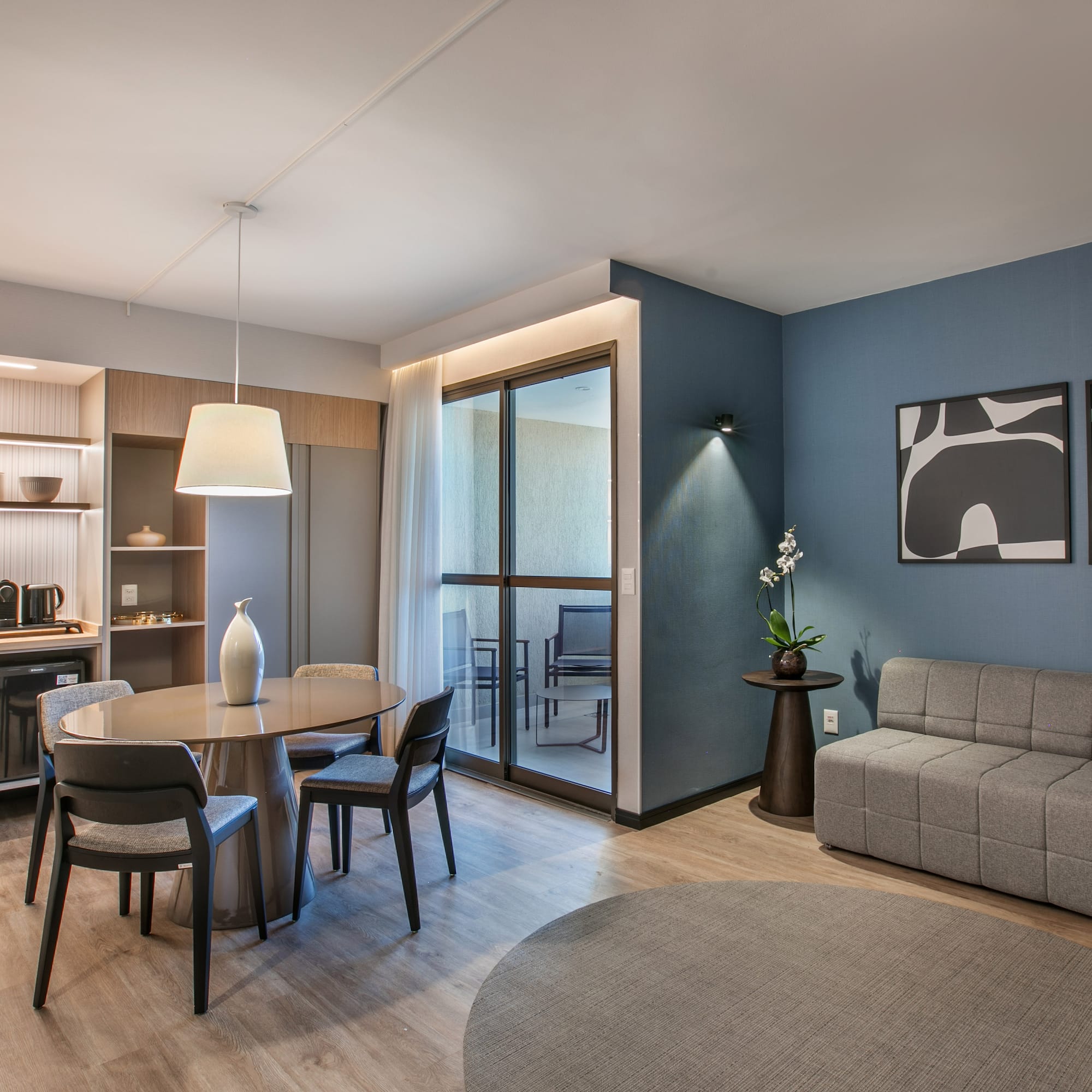 a room with a table and chairs